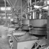 A collection of vibrating sieves being separated in the production line